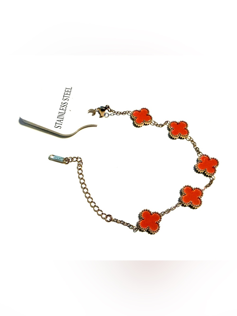 Gold Stainless Steel Bracelet with Orange Clover Charms